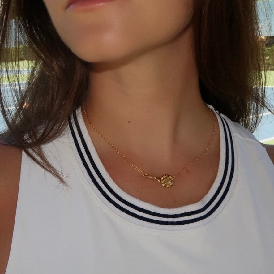 lottie tennis necklace, gold tennis racket necklace, morgan riddle necklace, tenniscore
