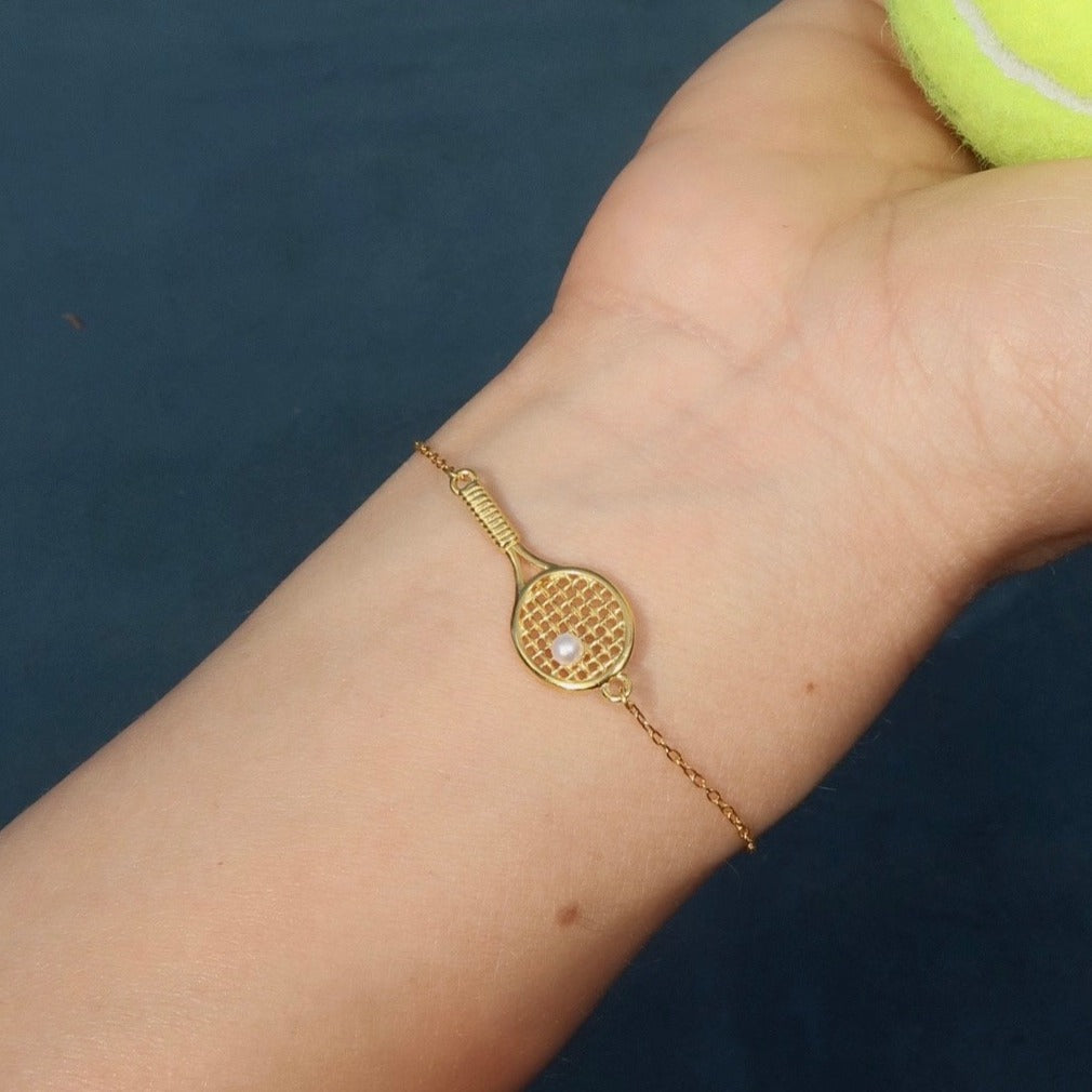 Tennis Racket Bracelet, tennis bracelet, tennis necklace, lottie nyc, pearls, lottie nyc tennis bracelet, morgan riddle, tenniscore, tennis WAGS, taylor fritz, Wimbledon, Tennis Fashion, Tennis Style, The Challengers, Zendaya, Paige Lorenze